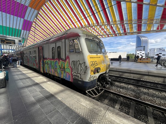 SNCB Break EMU covered in grime and graffiti at Liege Guillemins. 