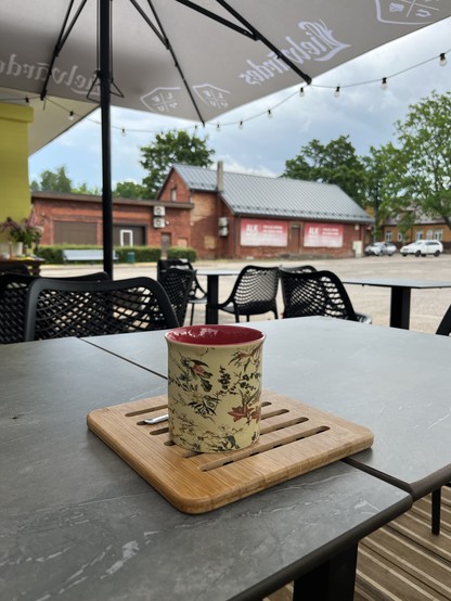 A coffee mug on a table. 