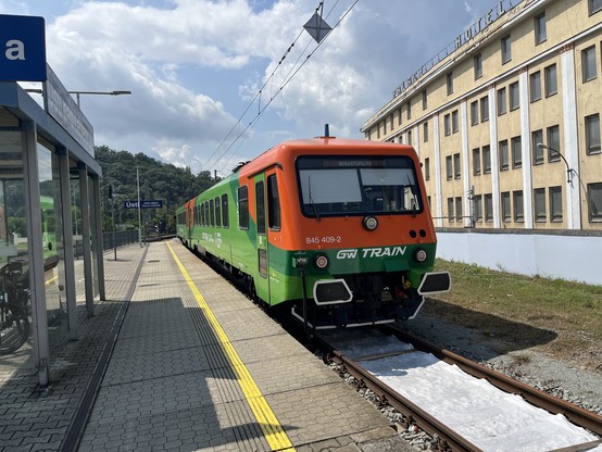 Orange and green DMU